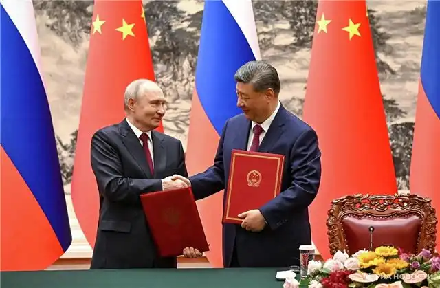 Путин заявил о плотной координации позиций России и Китая в G20 и НБР